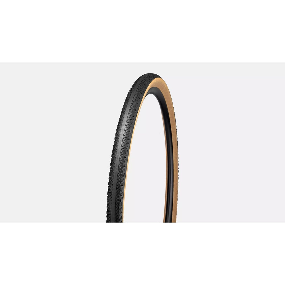 Specialized Pathfinder gravel tire with black tread and tan sidewalls on white background