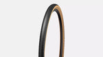 Specialized Pathfinder gravel tire with black tread and tan sidewalls on white background