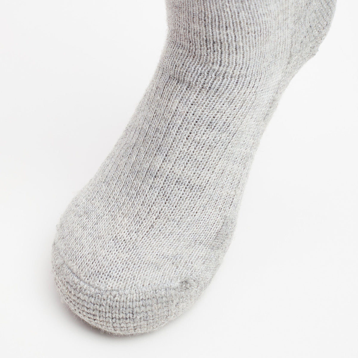 Thorlos light grey heather wool blend trekking crew sock close-up toe view