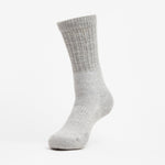 Thorlos light grey crew sock with ribbed cuff and cushioned sole displayed upright
