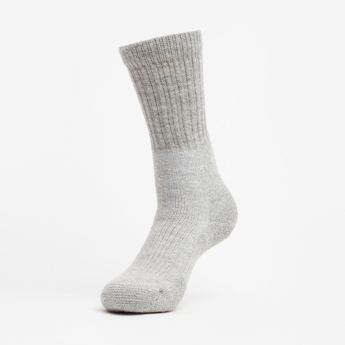 Thorlos light grey crew sock with ribbed cuff and cushioned sole displayed upright