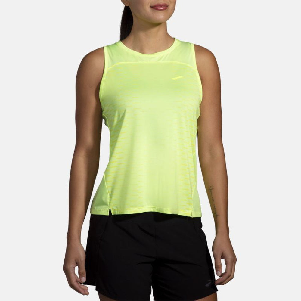 Brooks Sprint Free Tank 2.0 in LT Lime with interval gradient pattern on female model