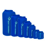 Sea To Summit blue lightweight dry bags in seven different sizes arranged by size