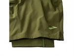 Brooks Sherpa 7-inch 2-in-1 men's running shorts in carbon green with liner
