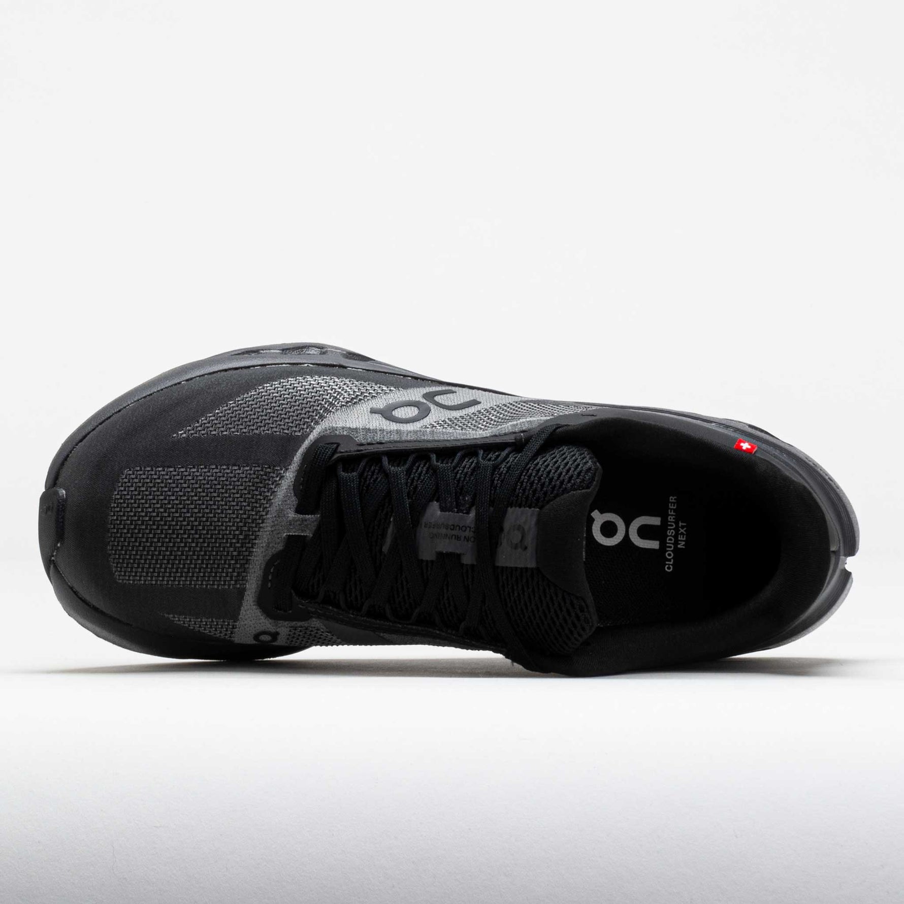 Top-down view of black On Cloudsurfer Next running shoe with grey mesh details