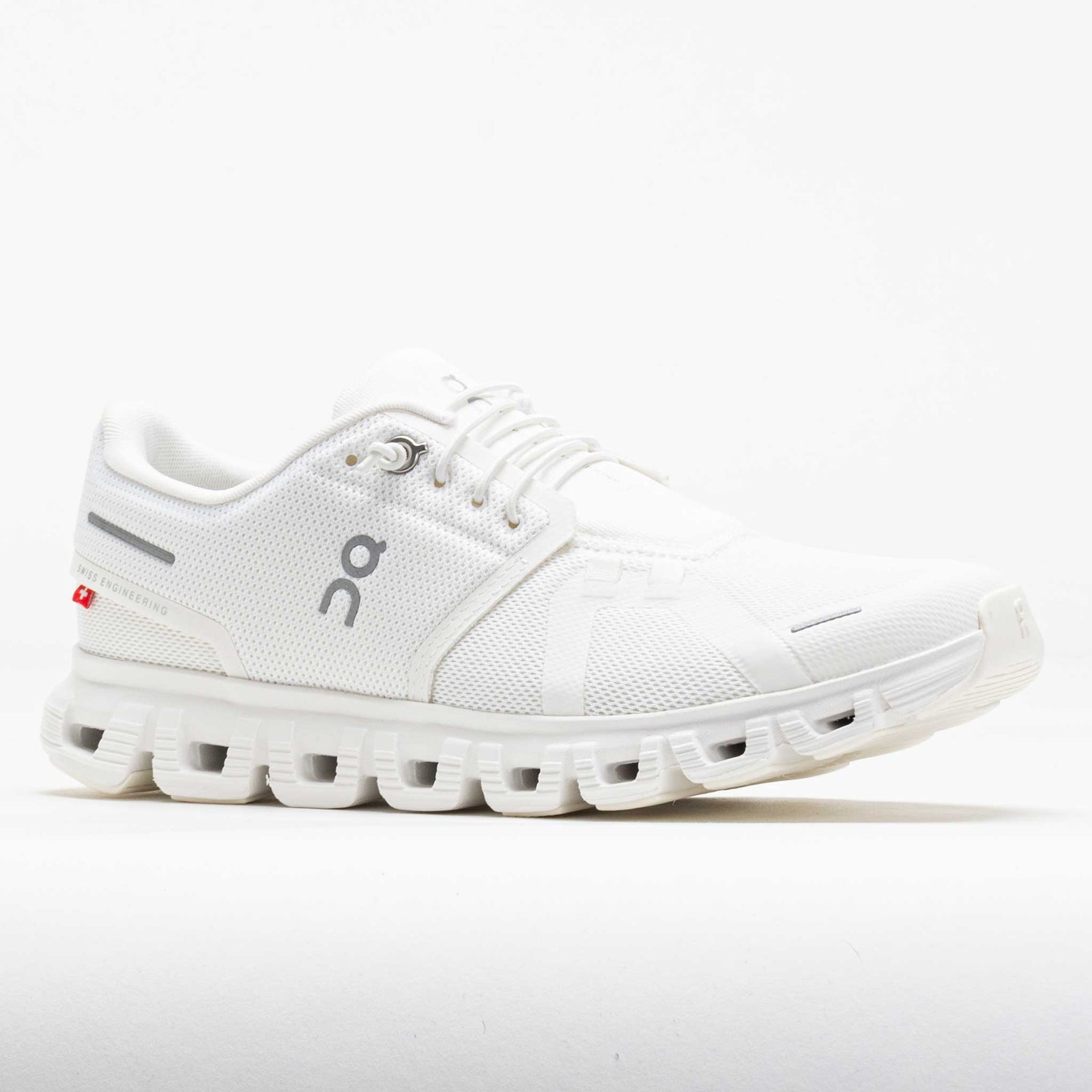 On Cloud 6 white running shoes with distinctive cloud sole technology