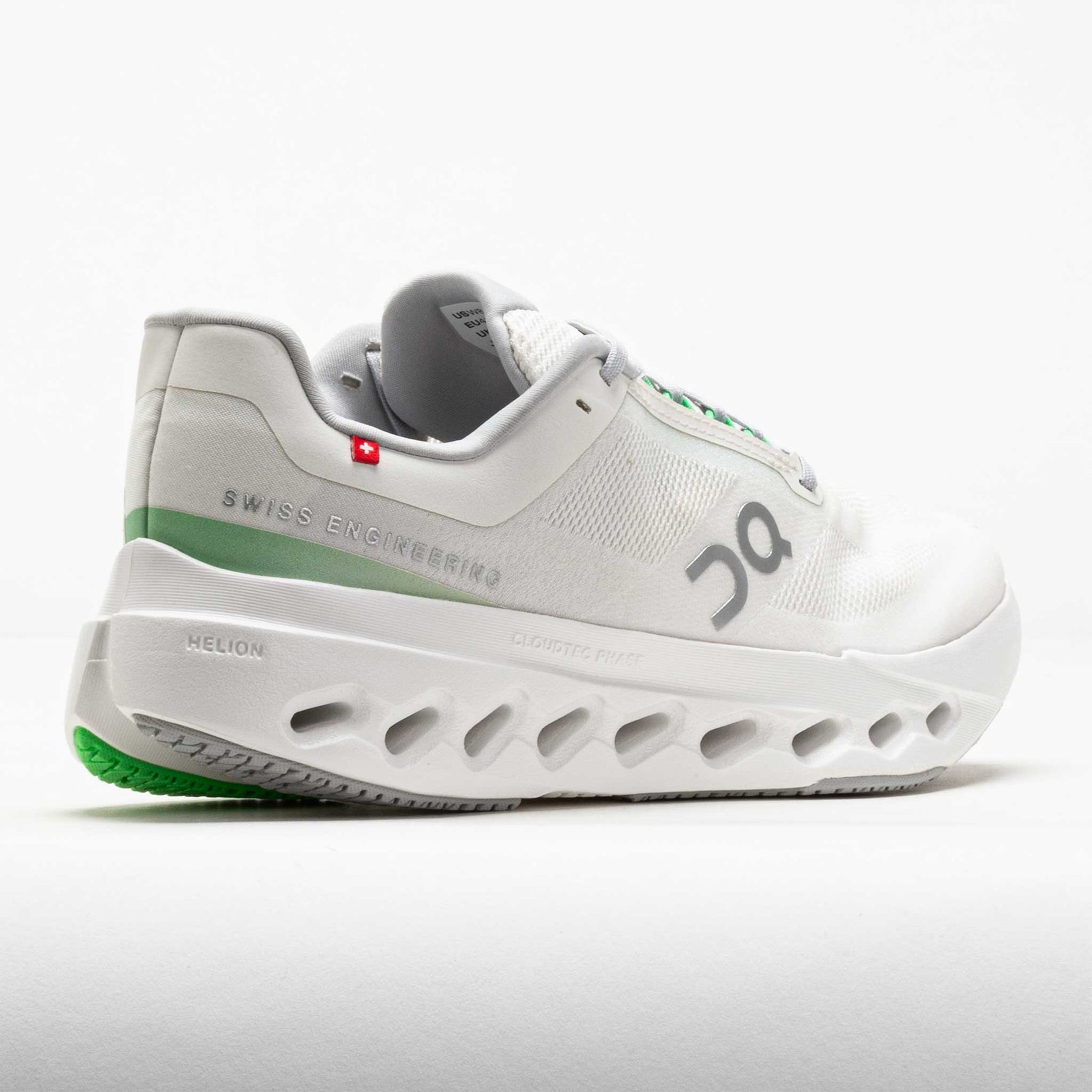 On Cloudsurfer Next women's running shoe in white with green stripe and CloudTec sole