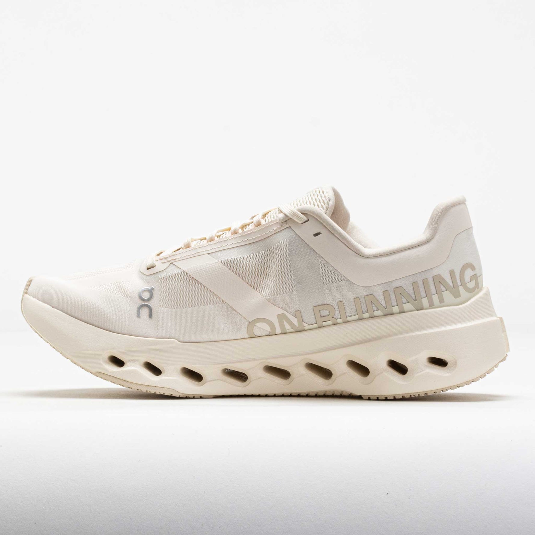 On Cloudsurfer Next women's running shoe in light cream dew colorway with signature cloud sole