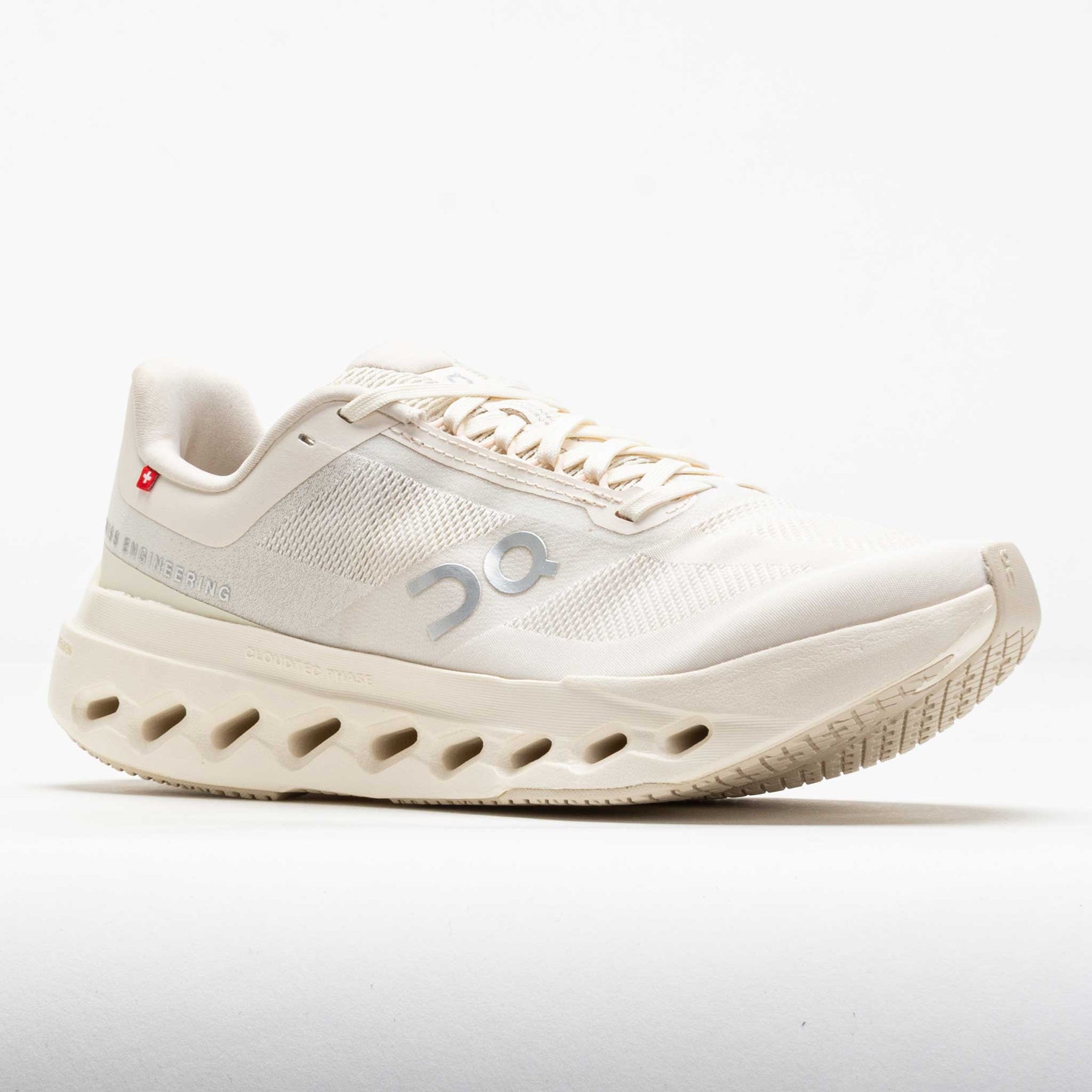 On Cloudsurfer Next women's running shoe in cream dew colorway with distinctive sole