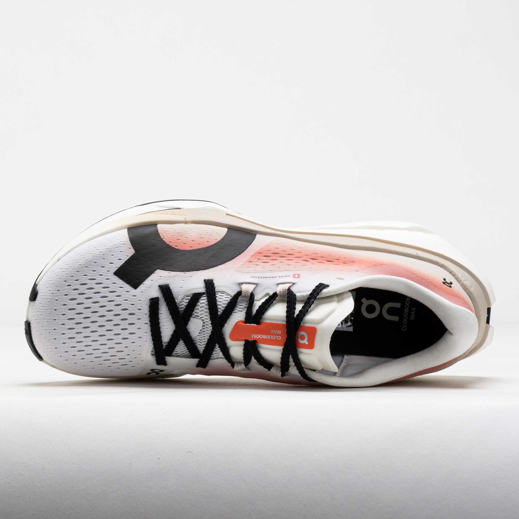 On Cloudboom Max men's running shoe in white with coral pink details, top view