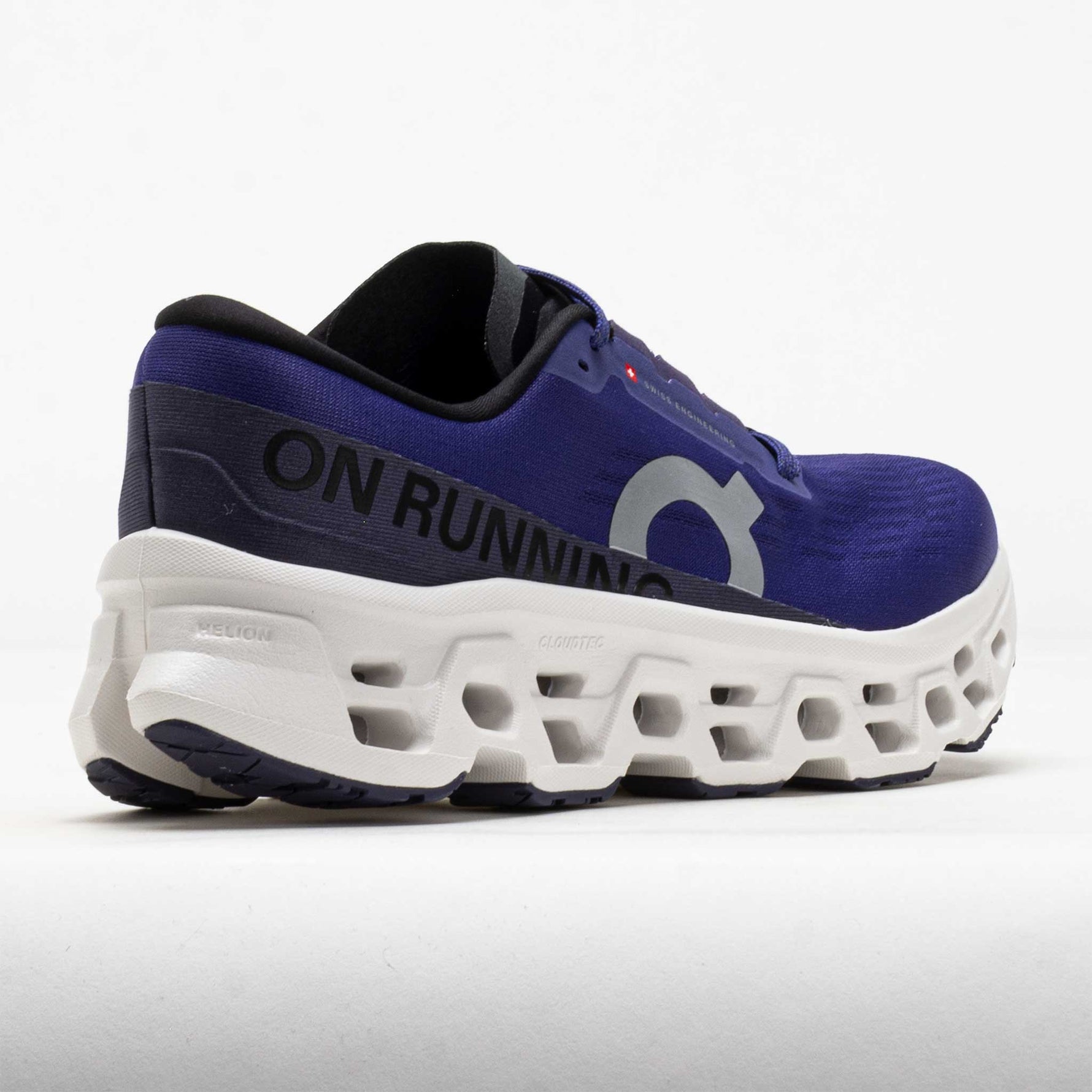 On Cloudmonster running shoe in blue and white with distinctive CloudTec sole technology