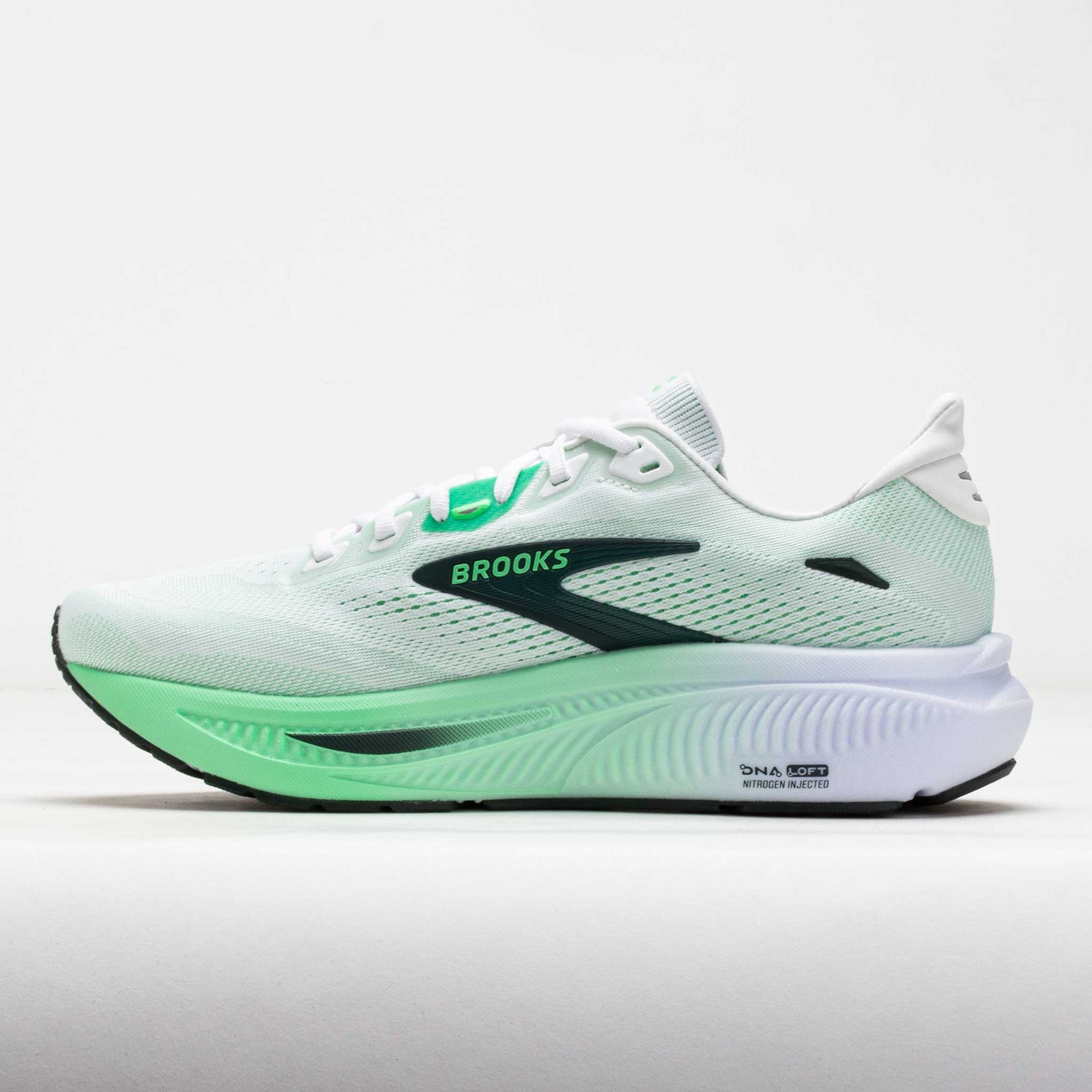 Brooks Ghost 18 running shoe in mint green colorway with professional studio lighting