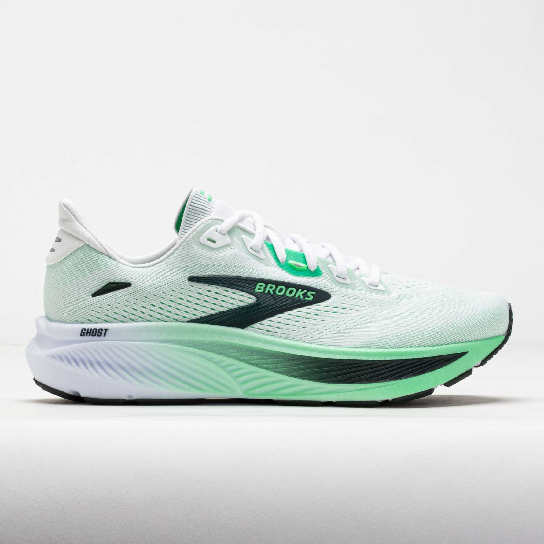 Brooks Ghost running shoe in white and spring green colorway on clean background