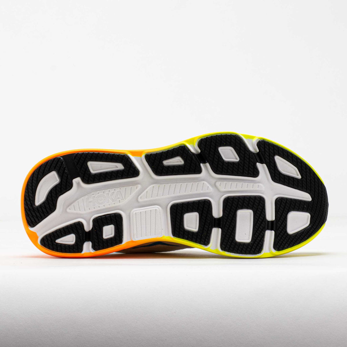 HOKA Bondi 9 running shoe outsole view showing black rubber tread with orange and neon accents