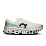 On Cloudmonster 3 running shoe in ivory white with green On Running branding and CloudTec sole