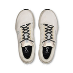 On Cloudsurfer Next running shoes in ivory and silver colorway, top view
