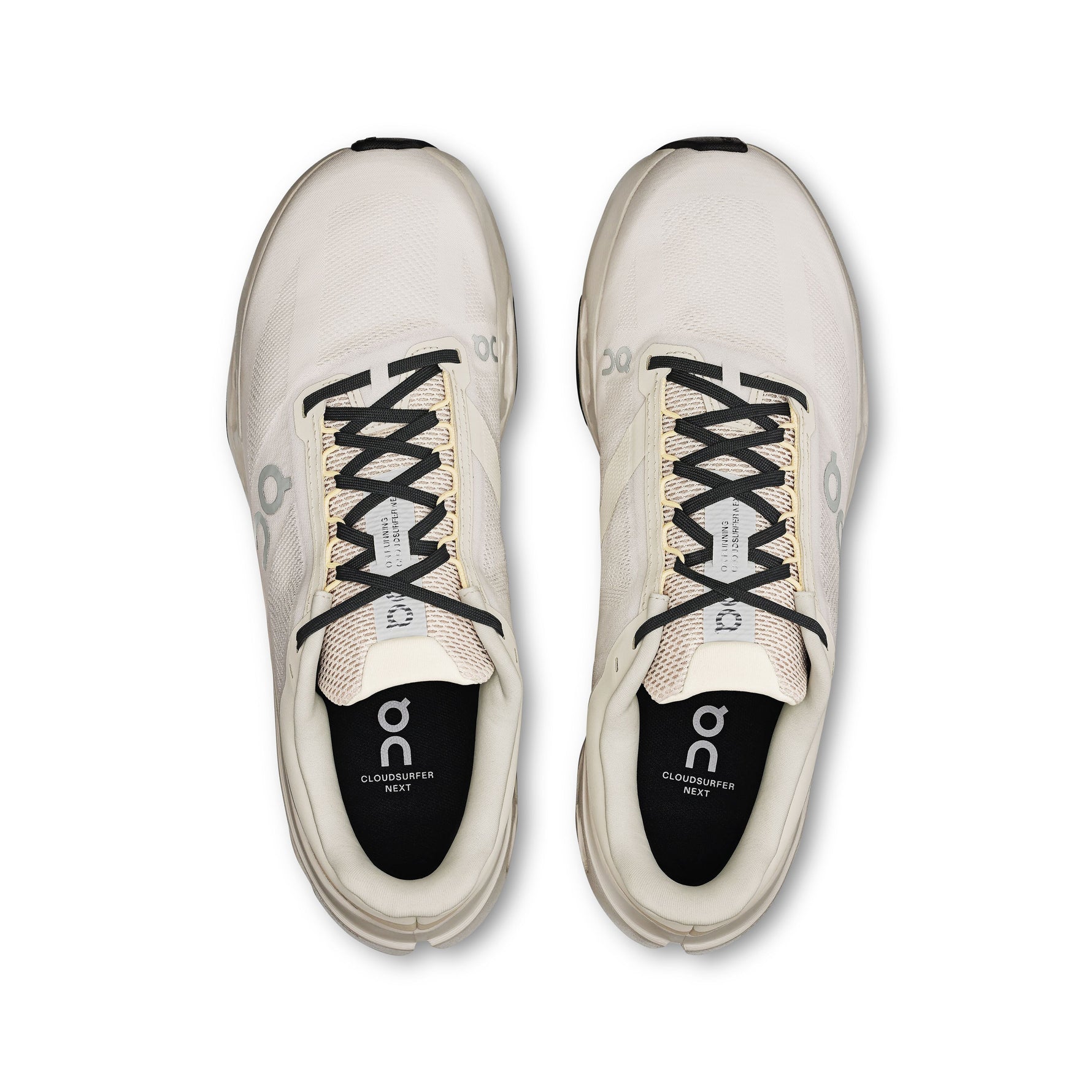 On Cloudsurfer Next running shoes in ivory and silver colorway, top view