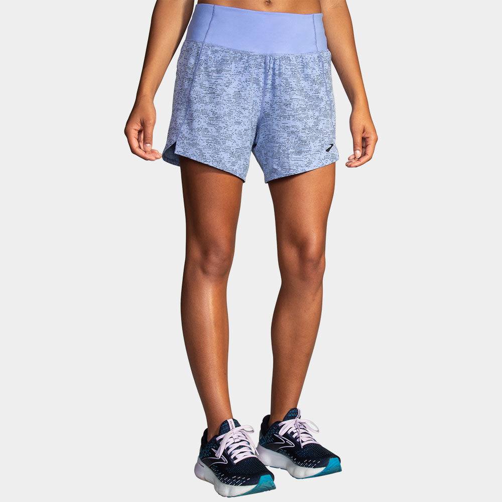 Brooks Chaser 5 inch running shorts in violet dash heathered blue on model