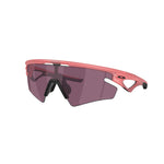 Oakley Sphaera sunglasses with coral pink frame and dark tinted lenses