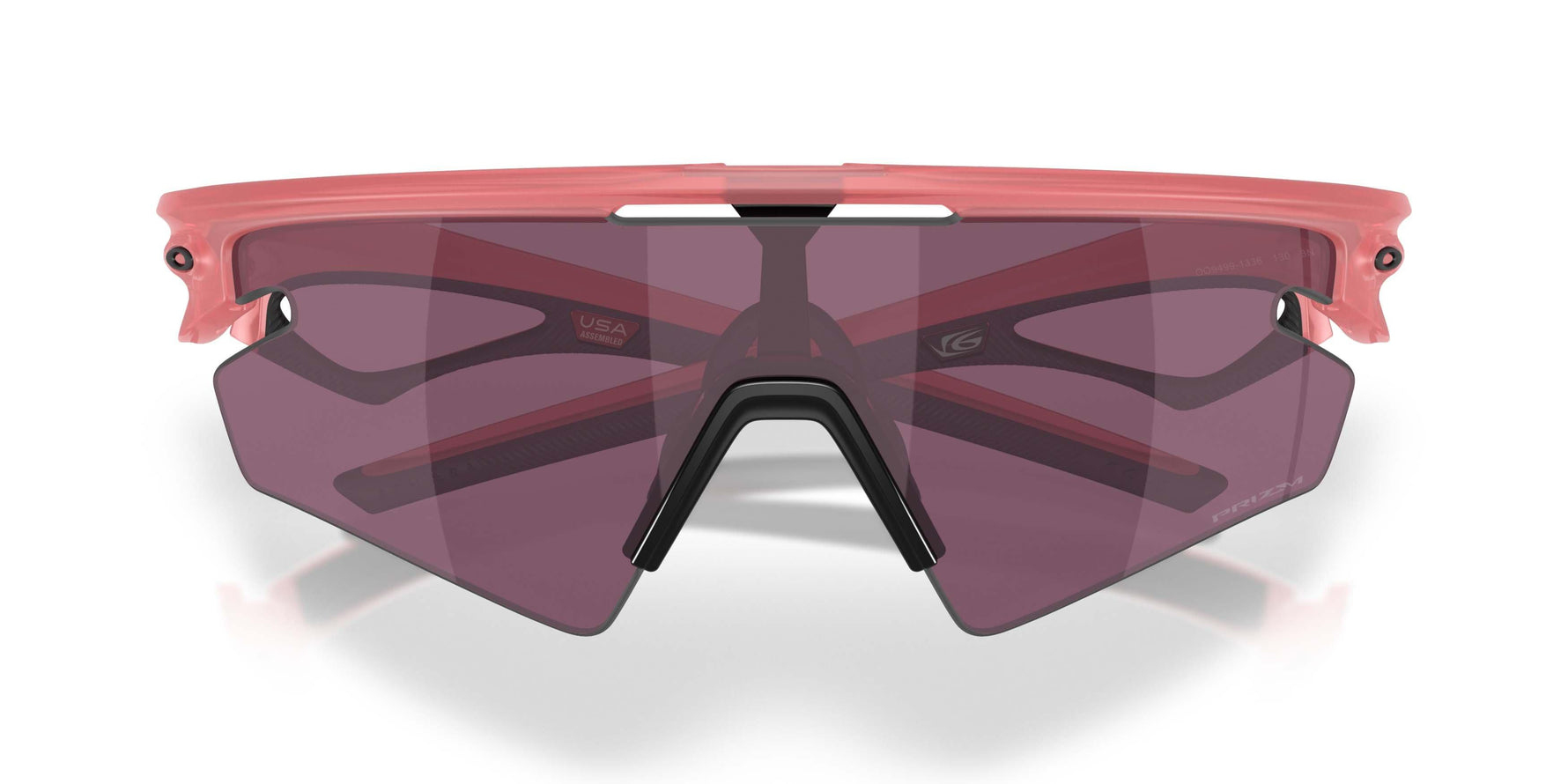 Oakley Sphaera sunglasses with coral pink frame and dark purple lenses on white background