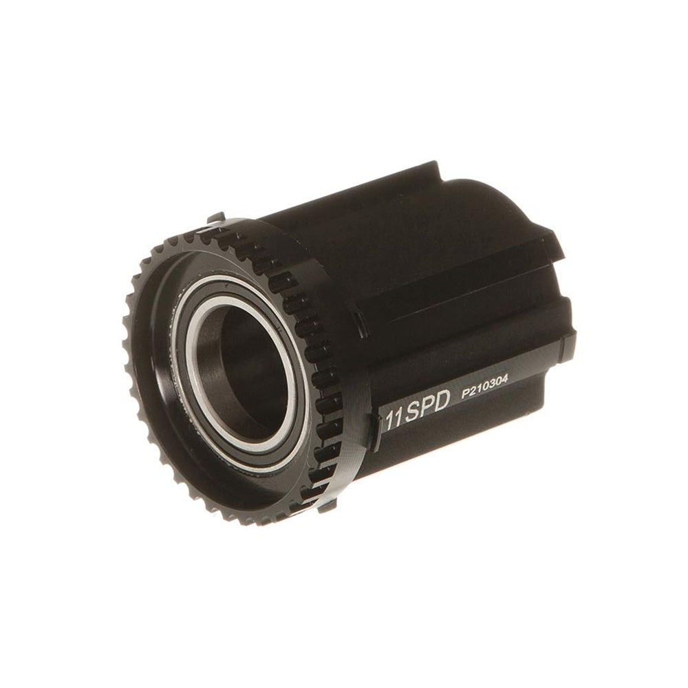 Black Zipp 11-speed Campagnolo freehub body with bearings on white background