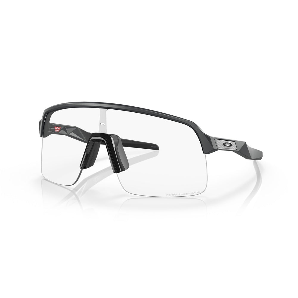 Oakley Sutro Lite sunglasses with matte carbon frame and clear photochromic lenses