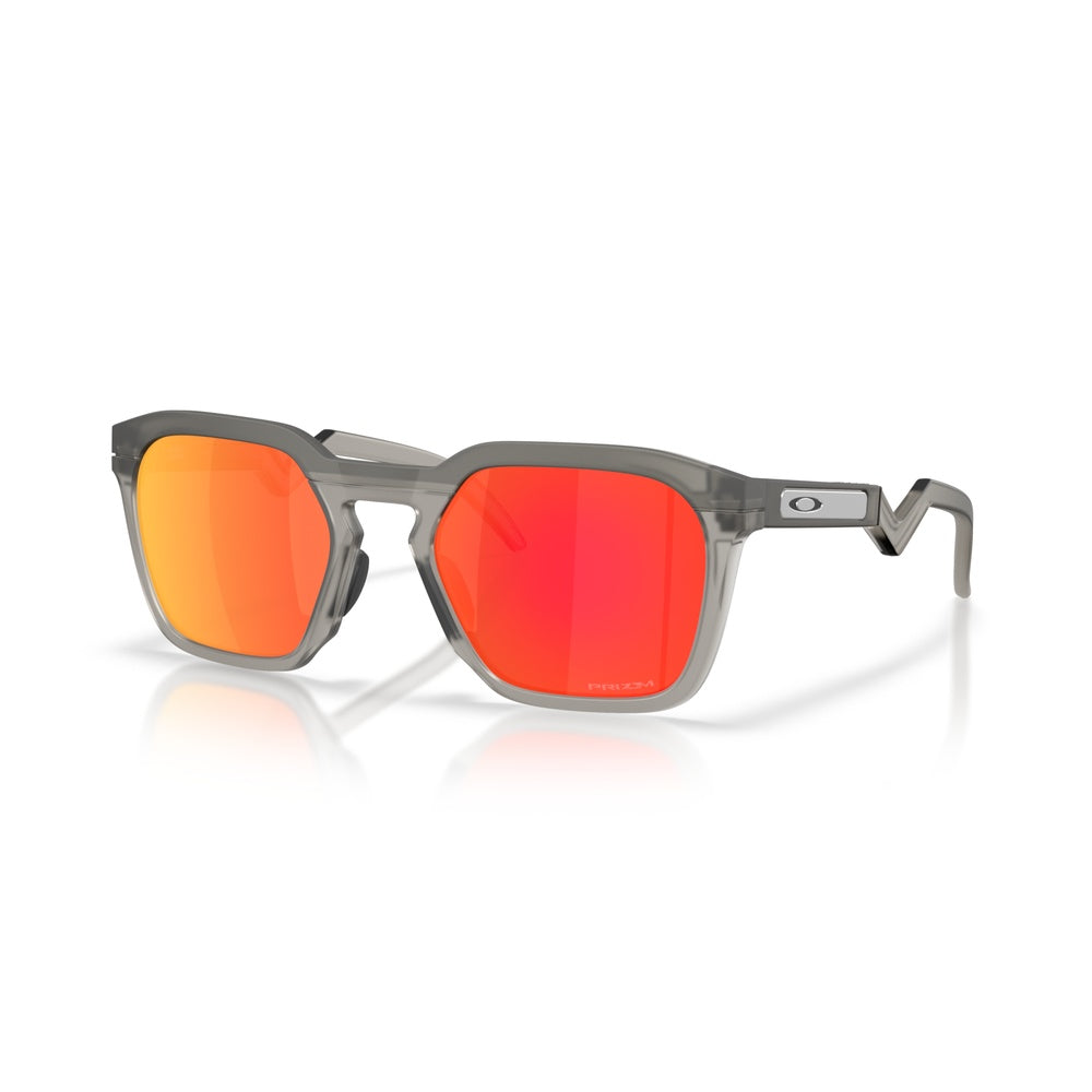 Oakley HSTN SQ sunglasses with matte grey smoke frame and Prizm Ruby red-orange mirrored lenses