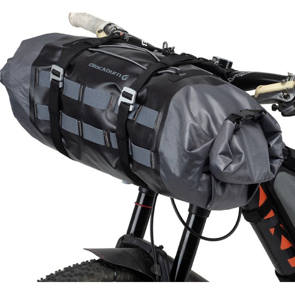 Blackburn Outpost Elite handlebar roll bag mounted on bicycle handlebars in black