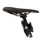 Lezyne Pocket Drive Lite Mini Pump mounted on bicycle seatpost with CO2 cartridges