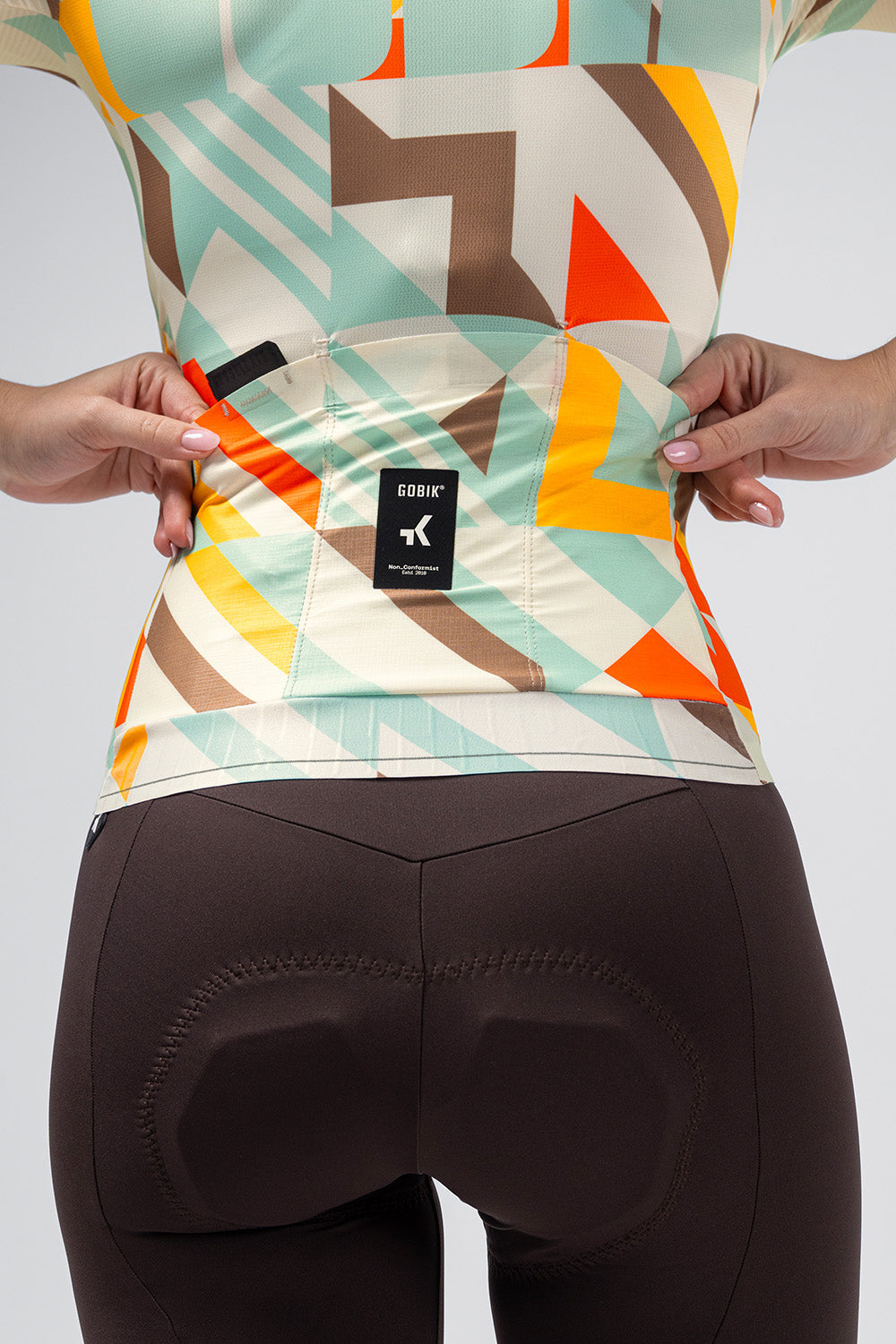 Gobik Attitude 2.0 jersey in colorful geometric Exa pattern on model
