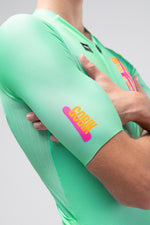 Gobik CX Pro 4.0 cycling jersey in mint green Blast colorway with crossed arms pose