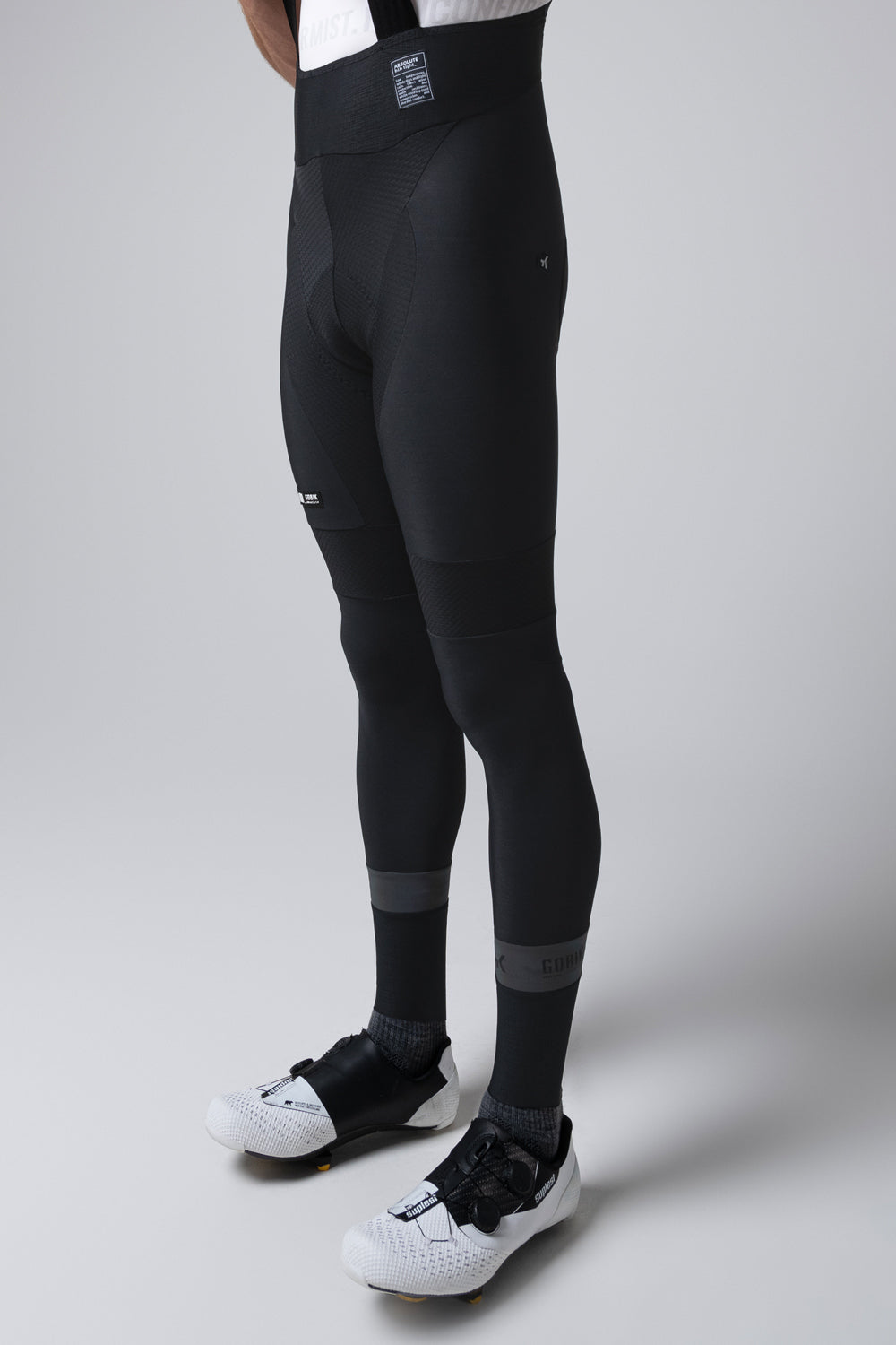 Black Gobik Absolute 7.0 bib shorts on model against white background