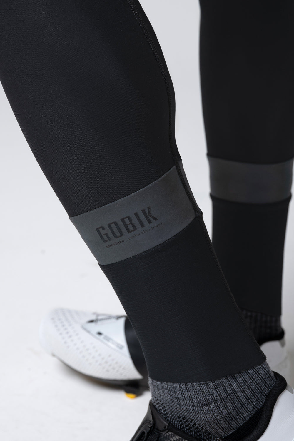 Gobik Absolute 7.0 black bib shorts detail showing leg panel and branding