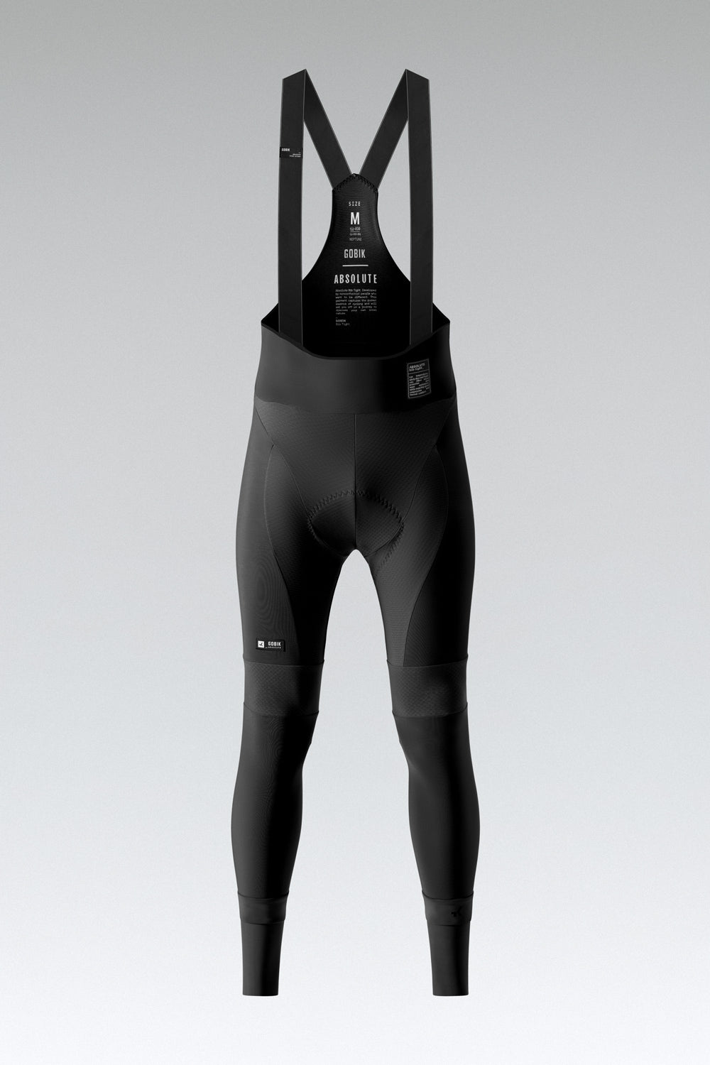 Gobik Absolute black cycling bib shorts with suspenders on gray background