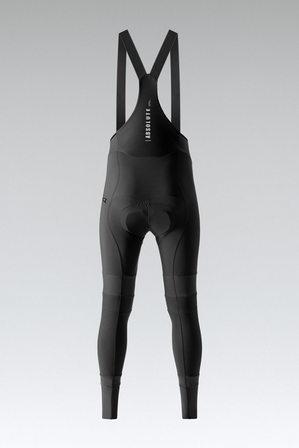 Black Gobik Absolute cycling bib shorts with shoulder straps on gray background