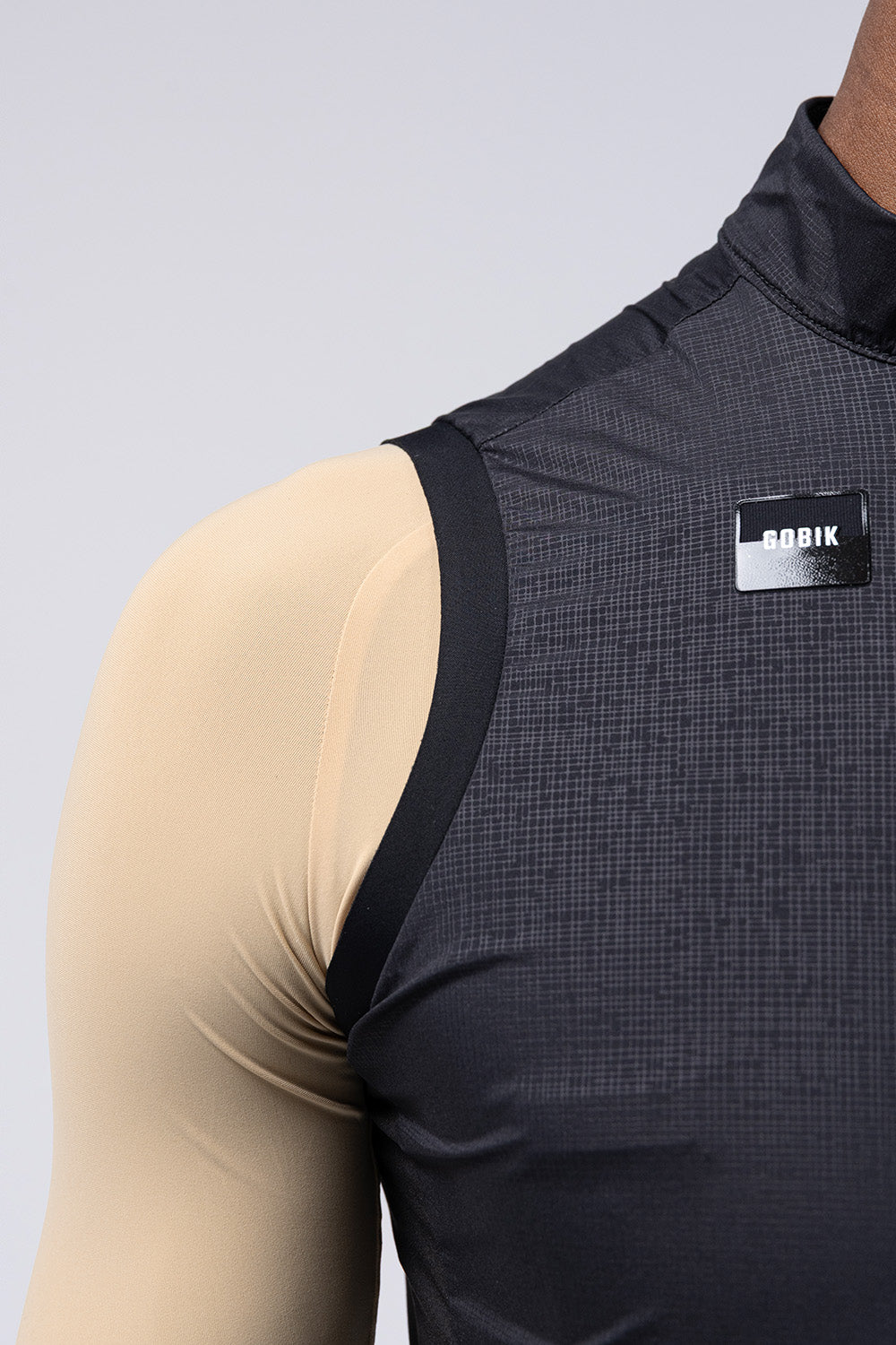 Gobik Vector 2.0 Men's Vest in Crow color showing dark charcoal fabric detail