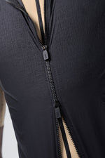 Gobik Vector 2.0 vest in crow black color showing zipper detail and fabric texture