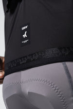 Gobik Vector 2.0 vest in black showing close-up detail of fabric and brand logo