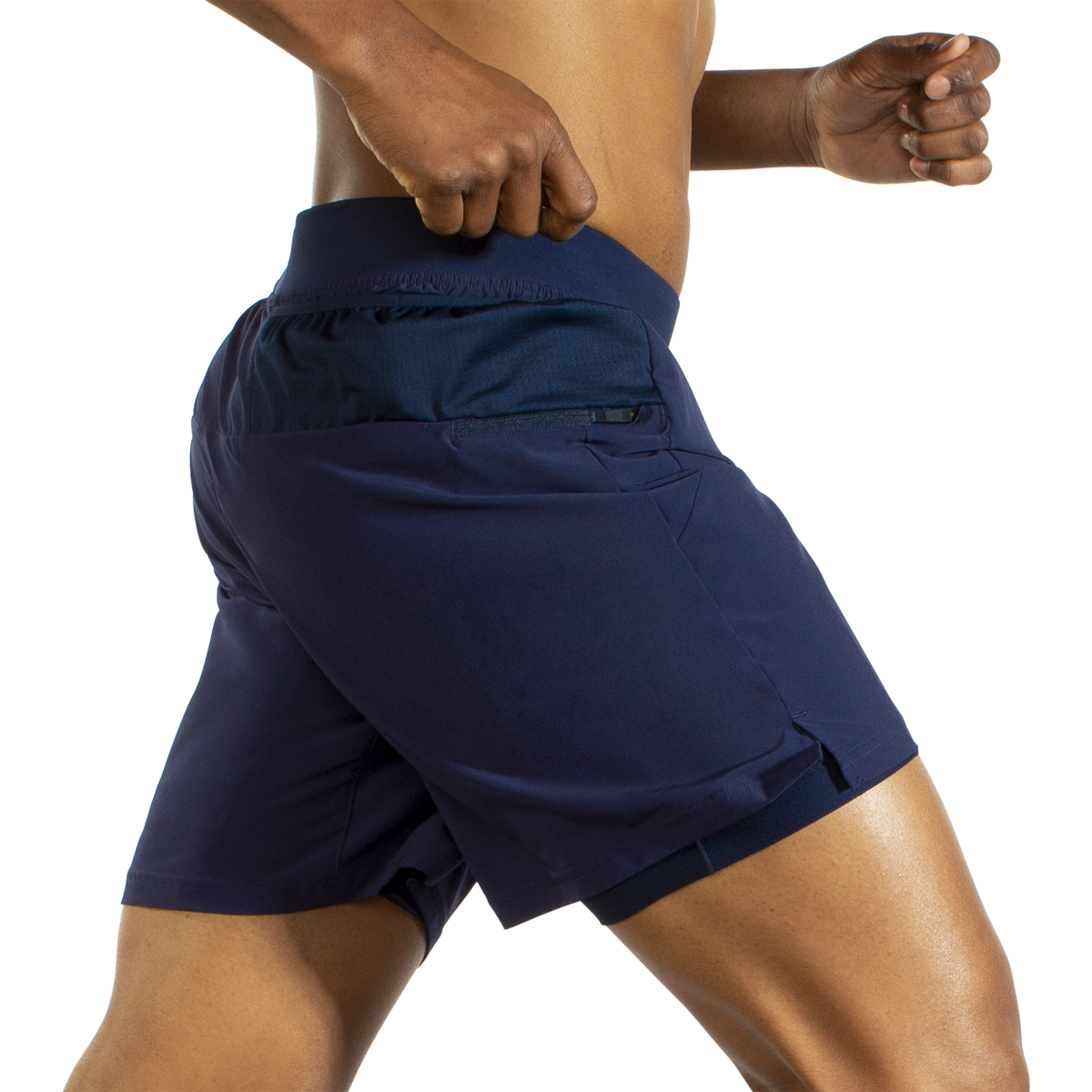 Man wearing Brooks Sherpa navy blue athletic shorts with built-in liner