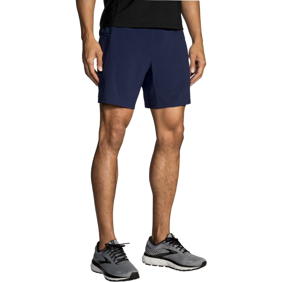 Man wearing Brooks Sherpa navy blue athletic shorts with running shoes