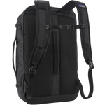 Patagonia Black Hole Mini MLC backpack in black showing shoulder straps and back panel