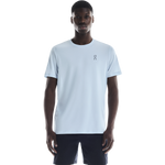 Man wearing light blue On Core-T shirt with small logo on chest