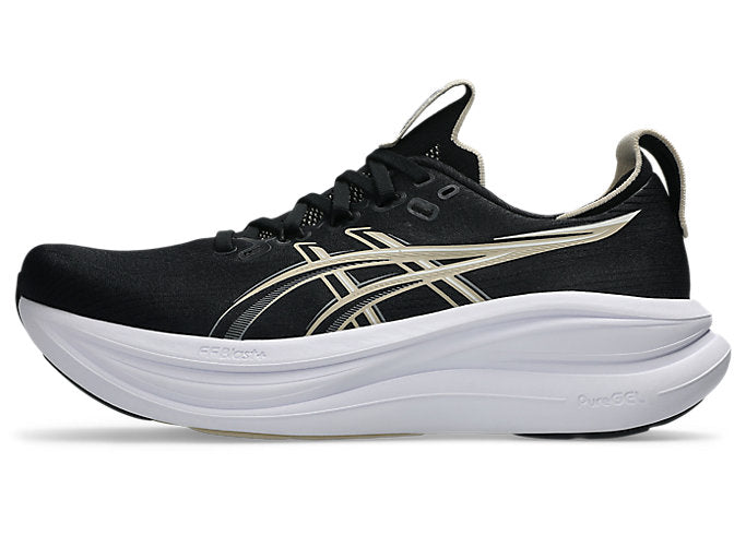 ASICS Gel Nimbus 28 running shoe in black with gold stripes and white midsole