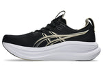 ASICS Gel Nimbus 28 running shoe in black with gold stripes on white background
