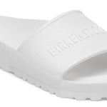 White Birkenstock Barbados EVA slide sandal with textured strap and molded footbed