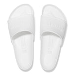 White Birkenstock Barbados Essentials EVA slides on clean white background