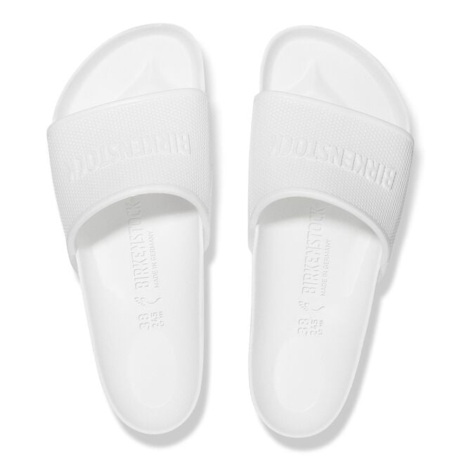 White Birkenstock Barbados Essentials EVA slides on clean white background