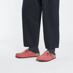 Birkenstock Boston clogs in coral red embossed suede worn with dark jeans