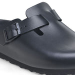 Black Birkenstock Boston Exquisite clog with buckle strap on white background