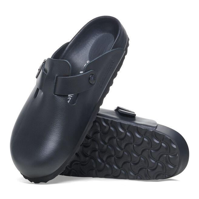 Black Birkenstock Boston clogs with adjustable strap and textured sole